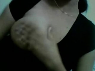 Horny girl flashes her melons on cam